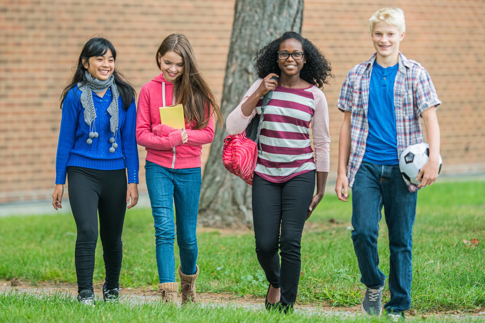 Adolescent Friends Walking to School Together
